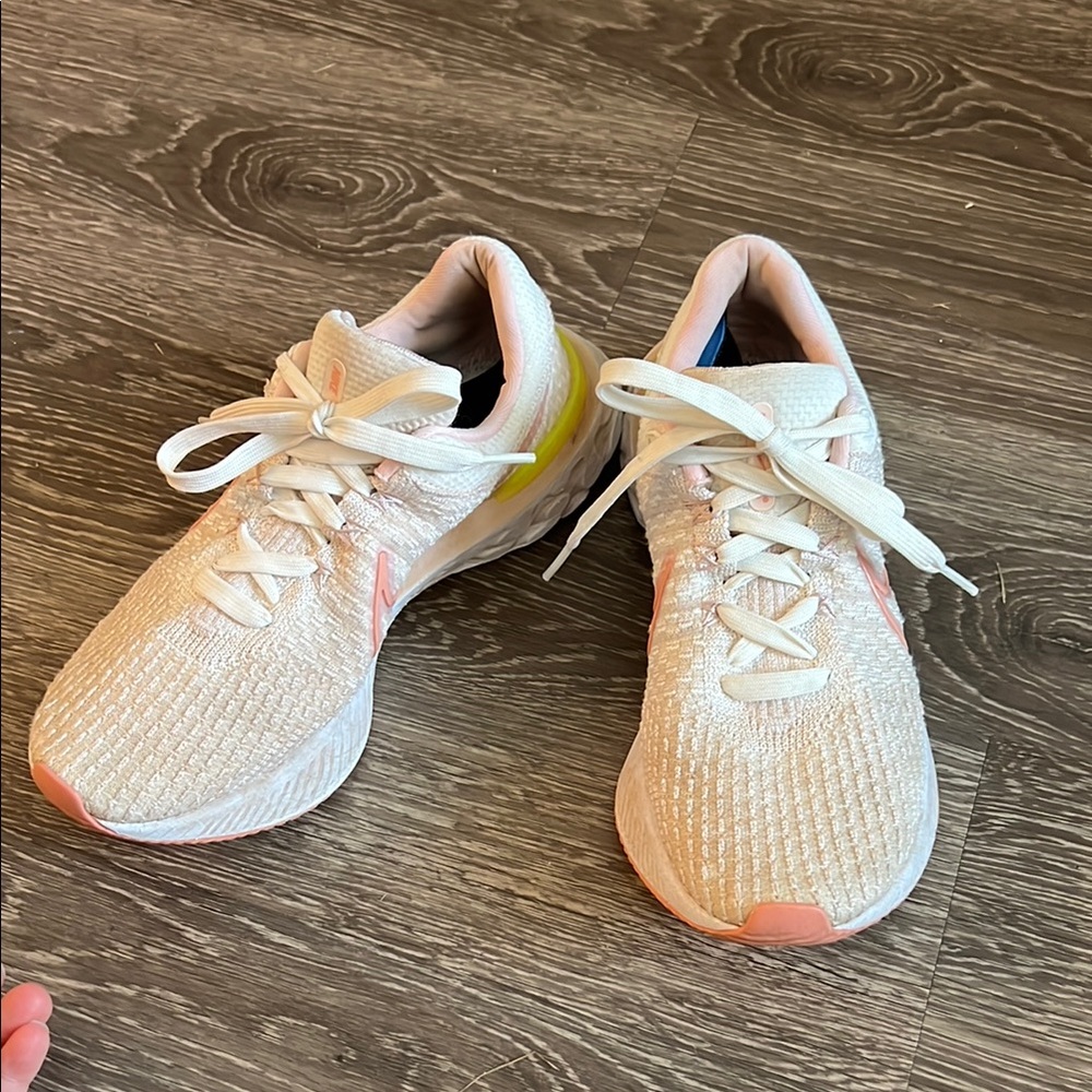 Women’s Nike React Infinity Run Cream and Pink Sneakers
